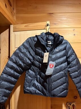 Nike Black Quilted Puffer Jacket with White Swoosh